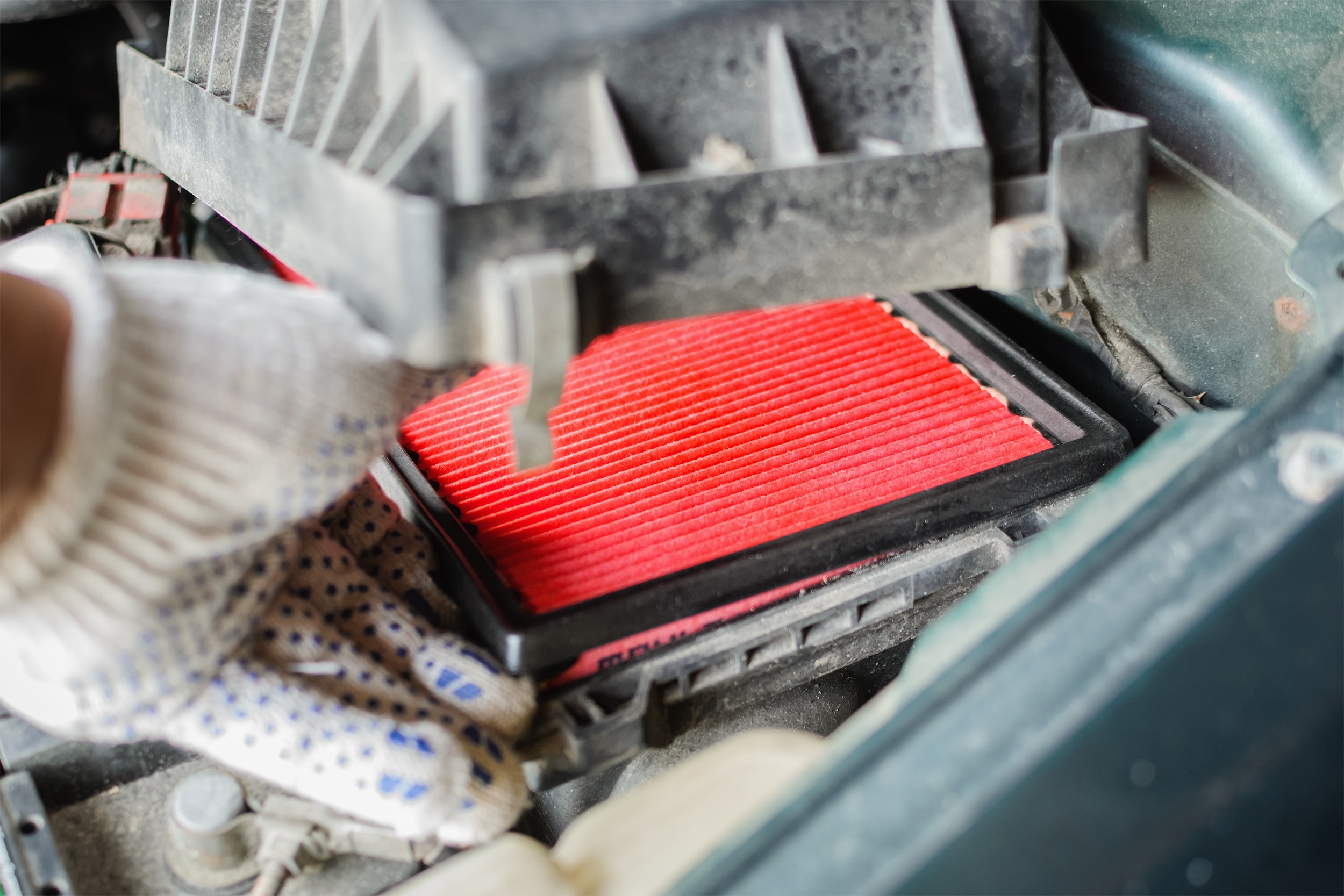 Service department removing old toyota air filter