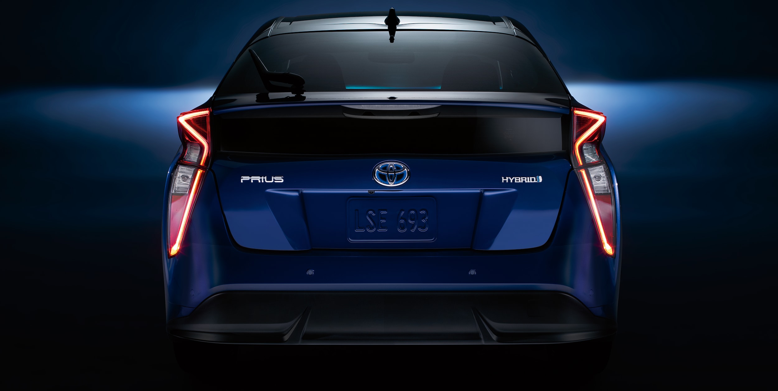 Rear vanity shot of a blue 2018 Toyota Prius