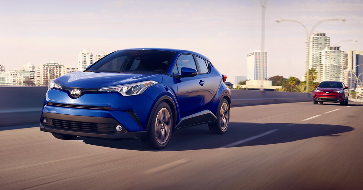 blue 2019 C-HR driving down the road