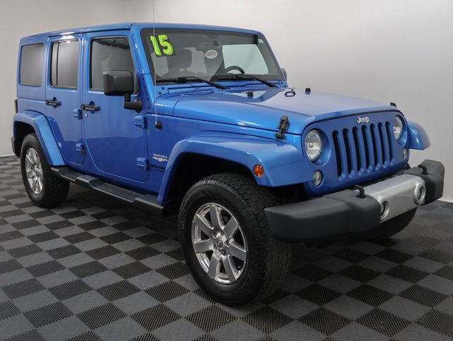 Used 2015 Jeep Wrangler Unlimited Sahara with VIN 1C4BJWEG6FL523559 for sale in Bay City, MI