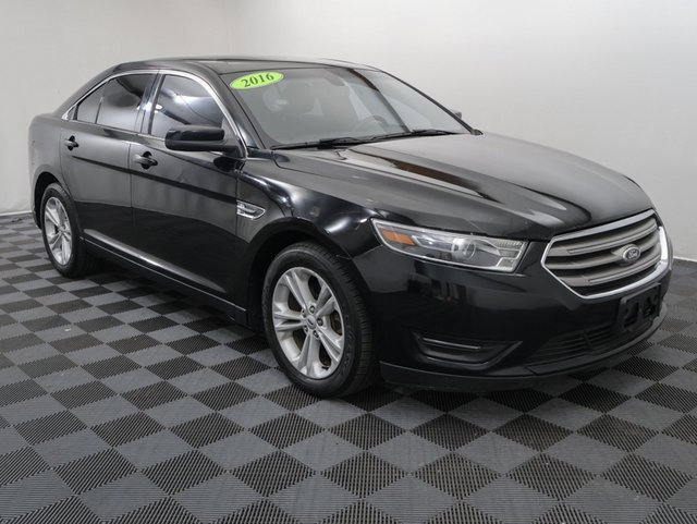 Used 2016 Ford Taurus SEL with VIN 1FAHP2H8XGG107925 for sale in Bay City, MI