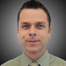 Staff member Eric Varaneckas from 560b6c7087b0