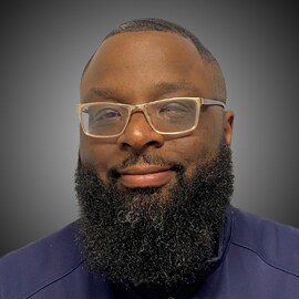Staff member Eddie Sutton from 6d80ec1c9214