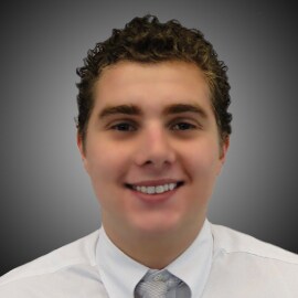 Staff member Paul Bellisario from 560b6c7087b0