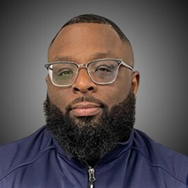 Staff member Eddie Sutton from 3f4539498266