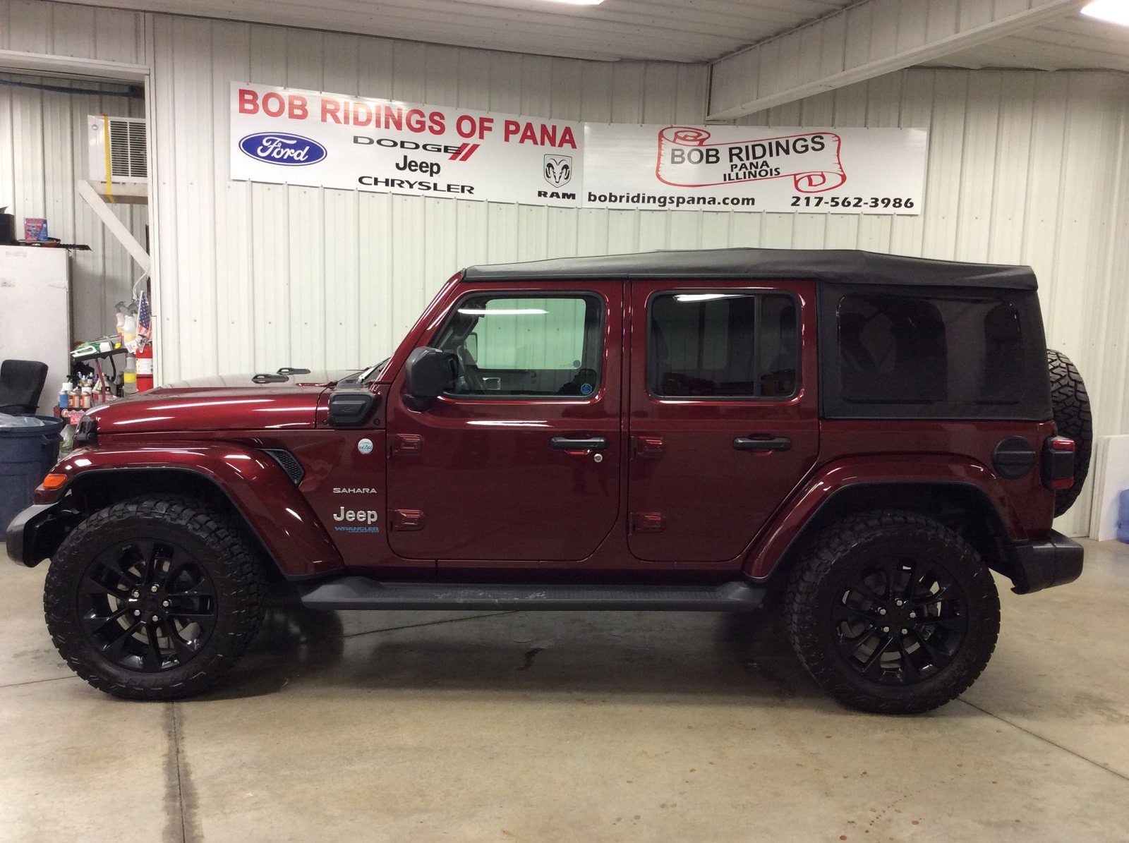 Used 2021 Jeep Wrangler Unlimited Sahara 4XE with VIN 1C4JJXP64MW702961 for sale in Pana, IL