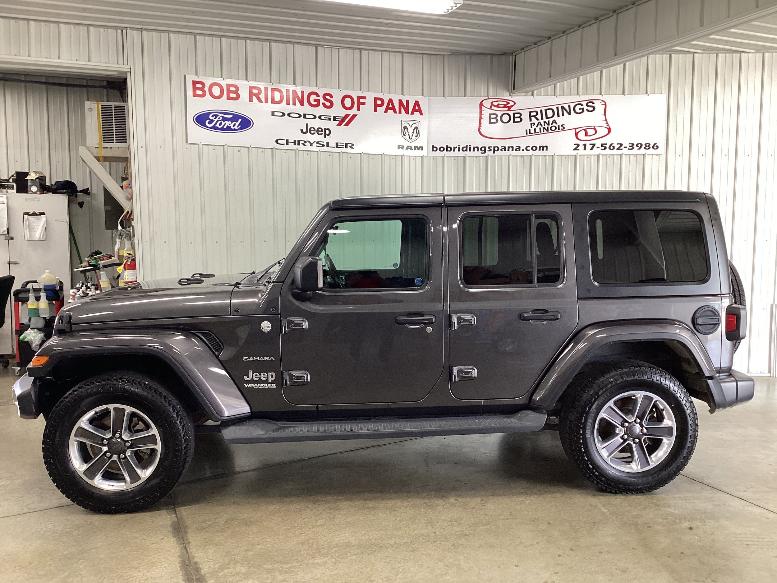 Used 2019 Jeep Wrangler Unlimited Sahara with VIN 1C4HJXEN3KW516219 for sale in Pana, IL
