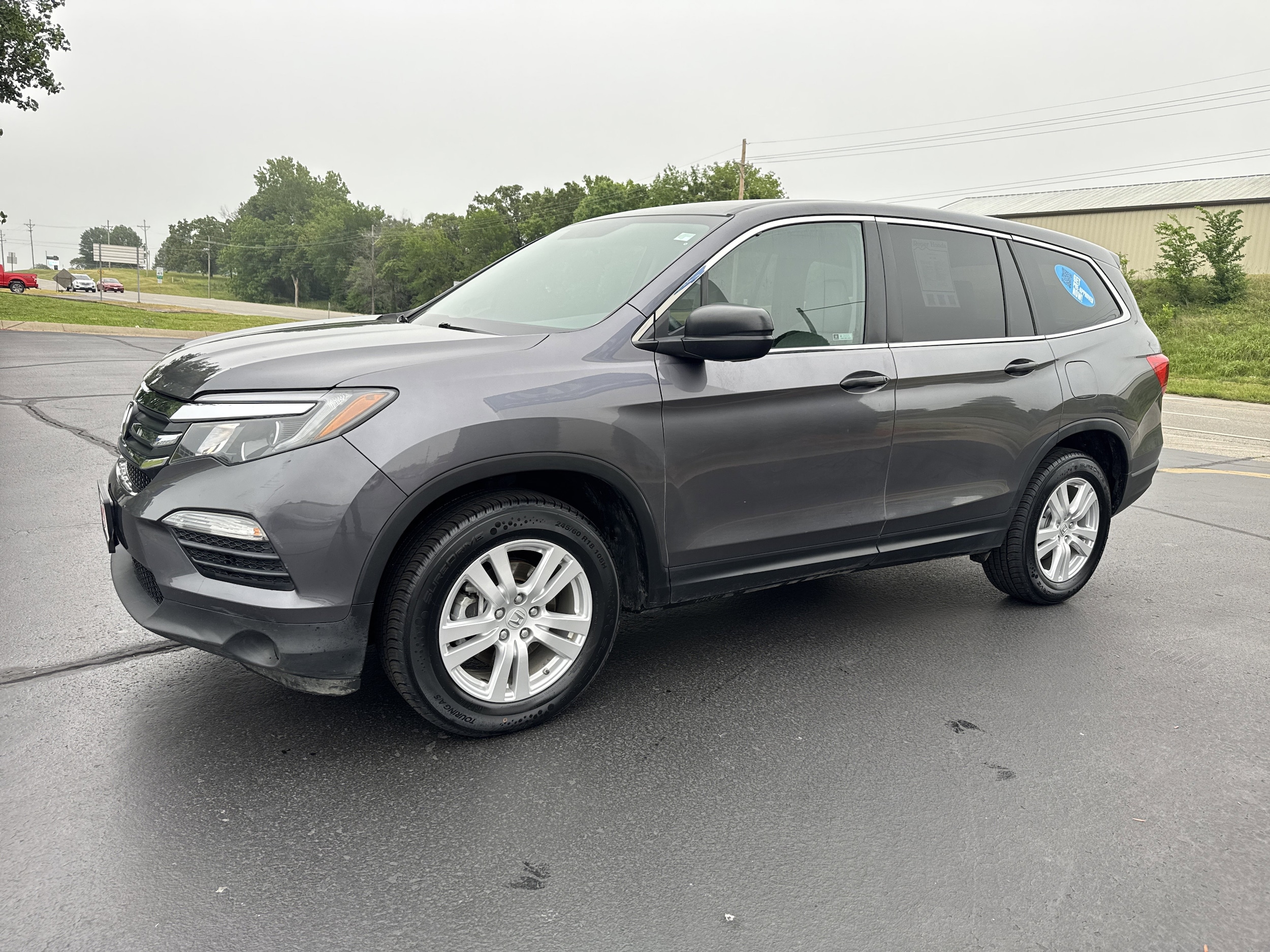 Used 2018 Honda Pilot LX with VIN 5FNYF6H15JB057864 for sale in Joplin, MO