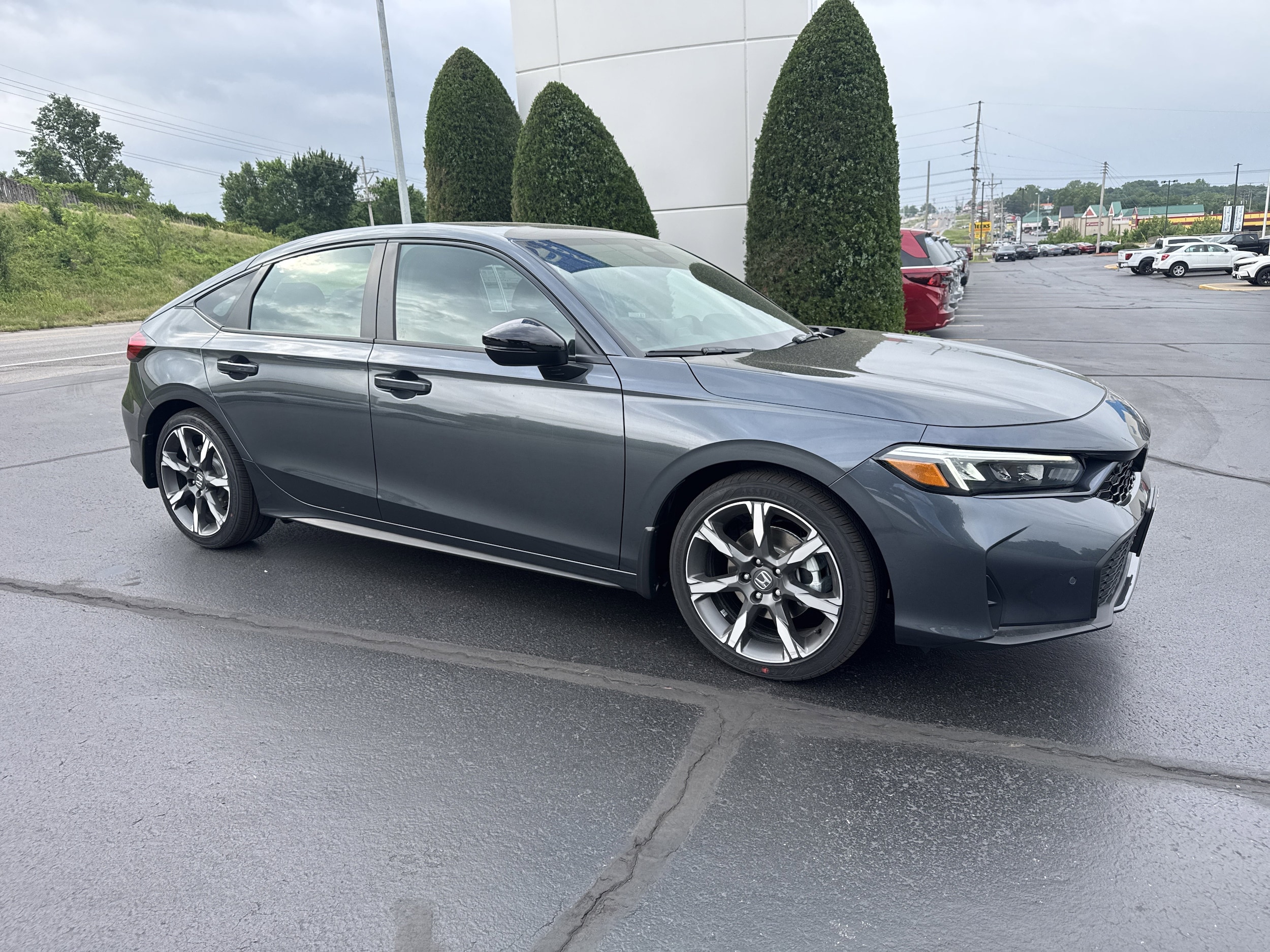 2026 Honda Civic Sport Touring Hybrid CVT's photo