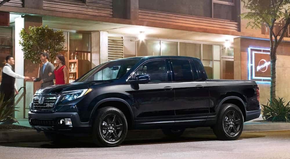 A black 2020 Honda Ridgeline Black Edition is shown parked after viewing used cars for sale near Ruston.