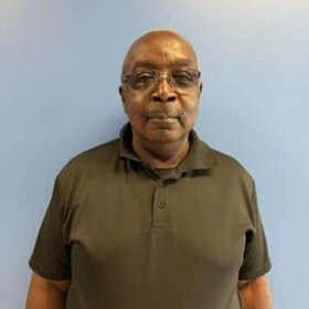 Staff member Norman Pettibone from ID_5a136c