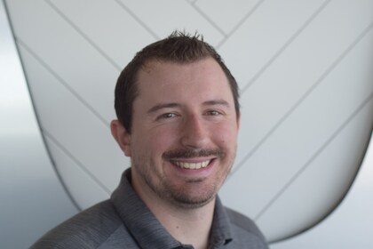 Staff member AUSTIN OLCOTT from ID_f2b9fc469925