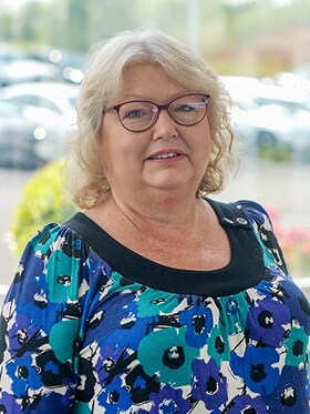 Staff member Norma Danos from 93e6a480db4c