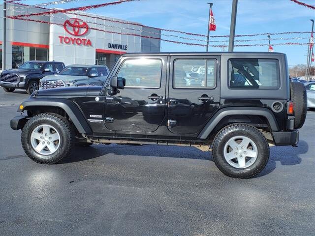 Used 2015 Jeep Wrangler Unlimited Sport with VIN 1C4BJWDGXFL710143 for sale in Tilton, IL