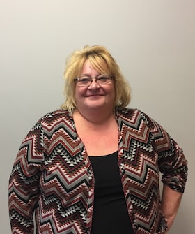 Staff member Kathy Learnard from ID_689385