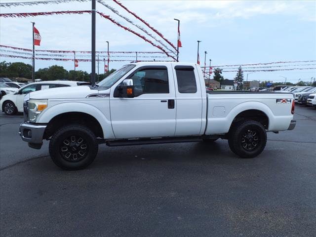 Used 2011 Ford F-250 Super Duty Lariat with VIN 1FT7X2B66BED04155 for sale in Tilton, IL