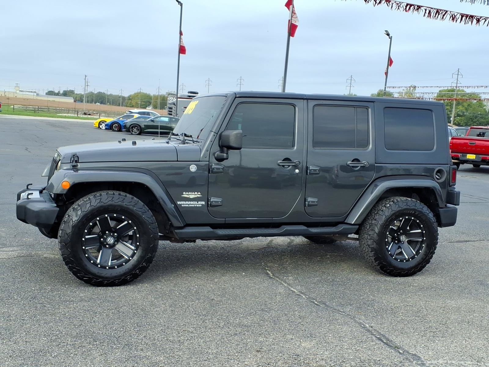 Used 2010 Jeep Wrangler Unlimited Sahara with VIN 1J4BA5H1XAL137604 for sale in Tilton, IL
