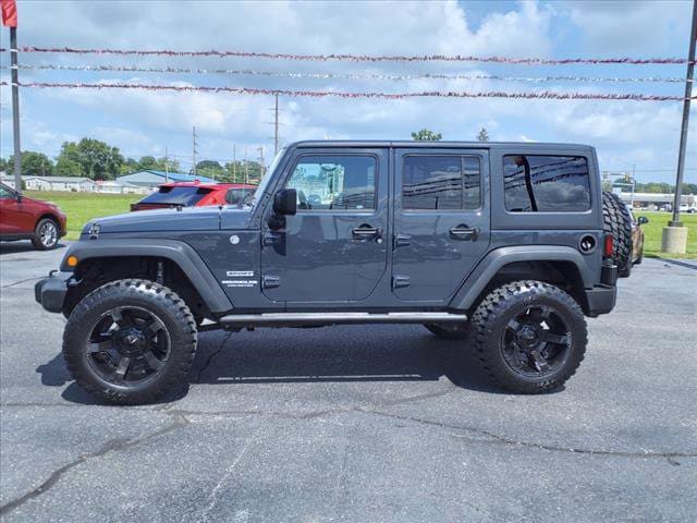 Used 2017 Jeep Wrangler Unlimited Sport S with VIN 1C4BJWDG0HL556965 for sale in Tilton, IL