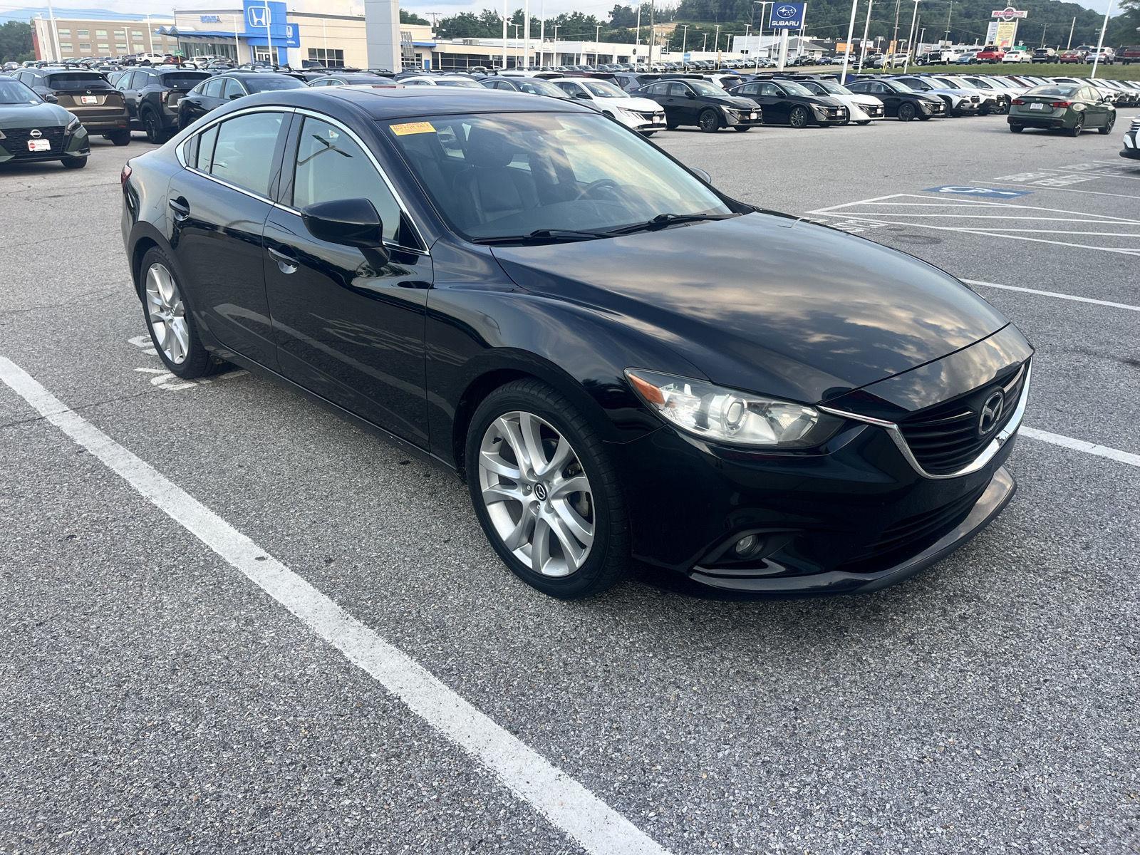 2015 Mazda EZ-6 i Touring Auto's photo