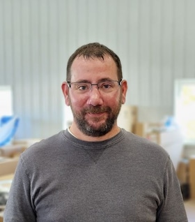 Staff member Chris Randall from ID_58e98ce61e61