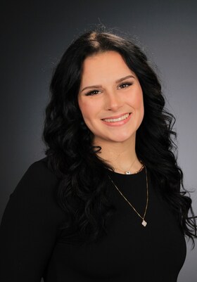 Staff member Dezeray Ferretti from ID_d6c512763b16