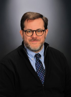Staff member Nicholas Flood from ID_ff3c8cafa161