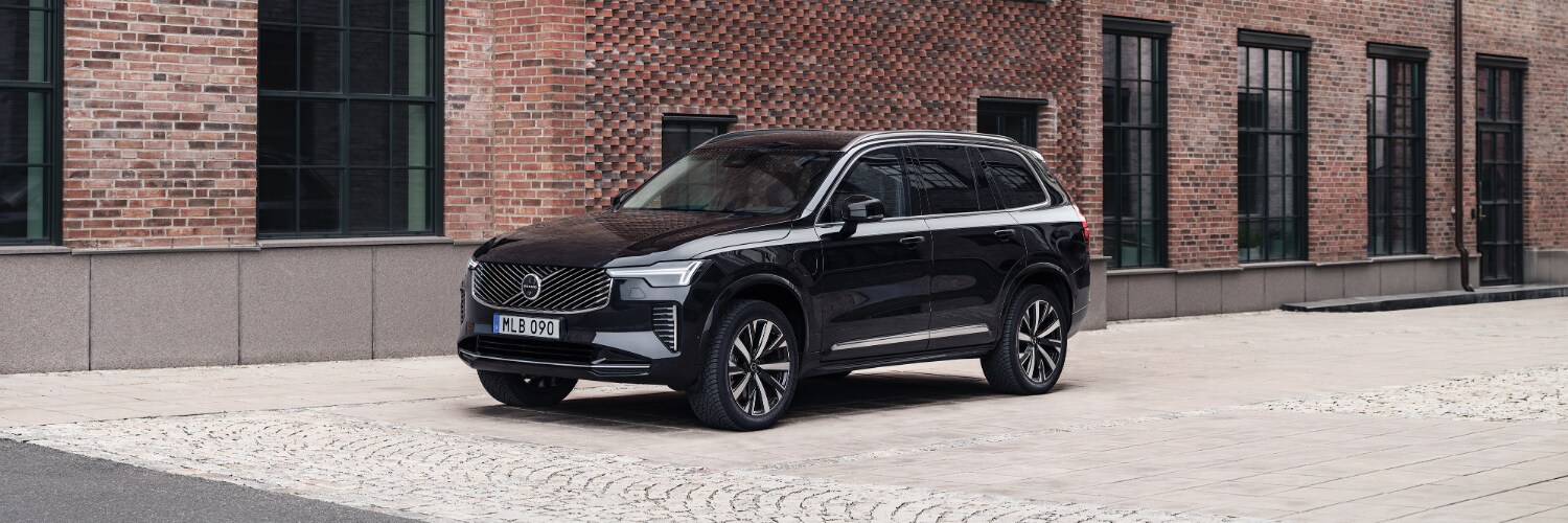 2026 Volvo XC90 Hybrid on a cobblestone street