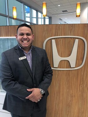 Staff member John Santos from ID_3235045ac4b0