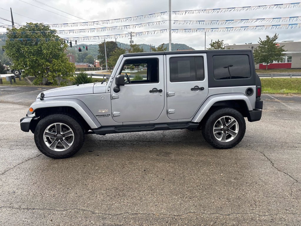 Used 2015 Jeep Wrangler Unlimited Sahara with VIN 1C4BJWEG2FL568370 for sale in Morehead, KY