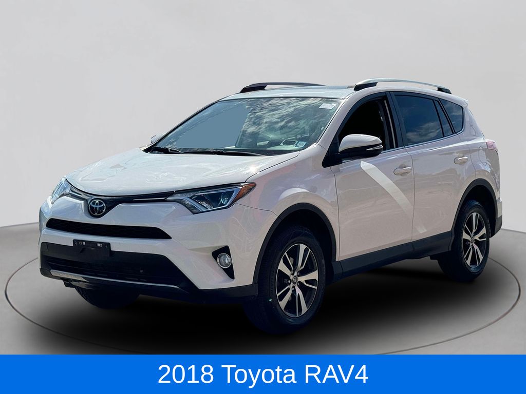 Used 2018 Toyota RAV4 XLE with VIN JTMRFREV4JD249202 for sale in Riverhead, NY