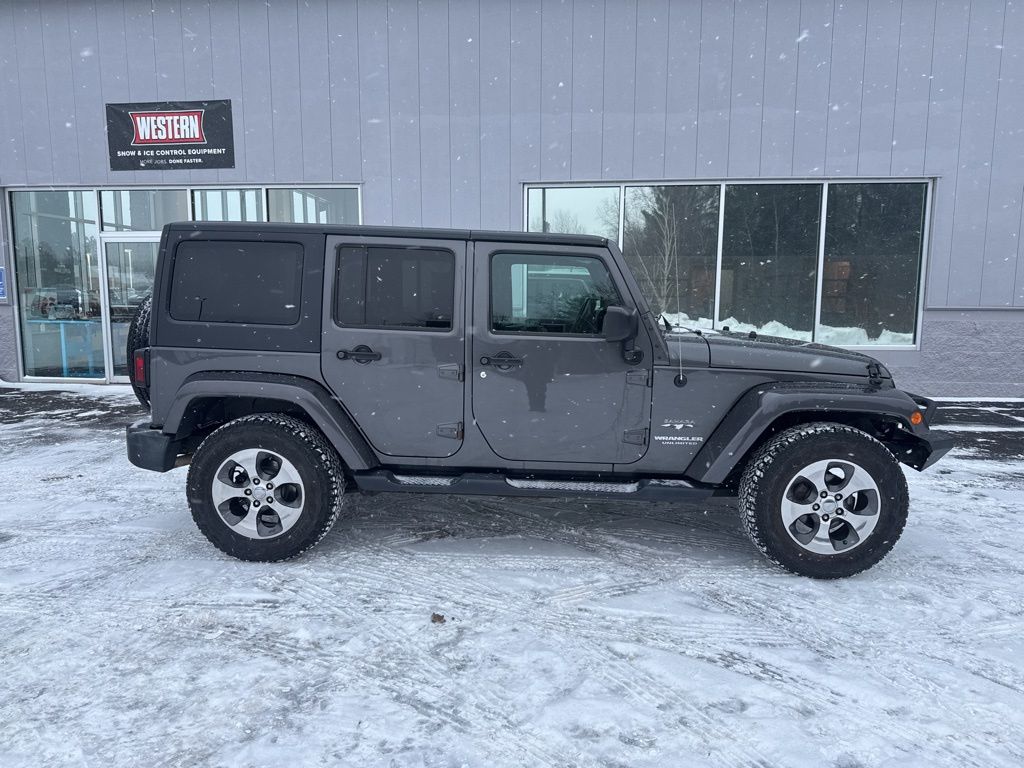Used 2017 Jeep Wrangler Unlimited Sahara with VIN 1C4HJWEG5HL512212 for sale in Eagle River, WI