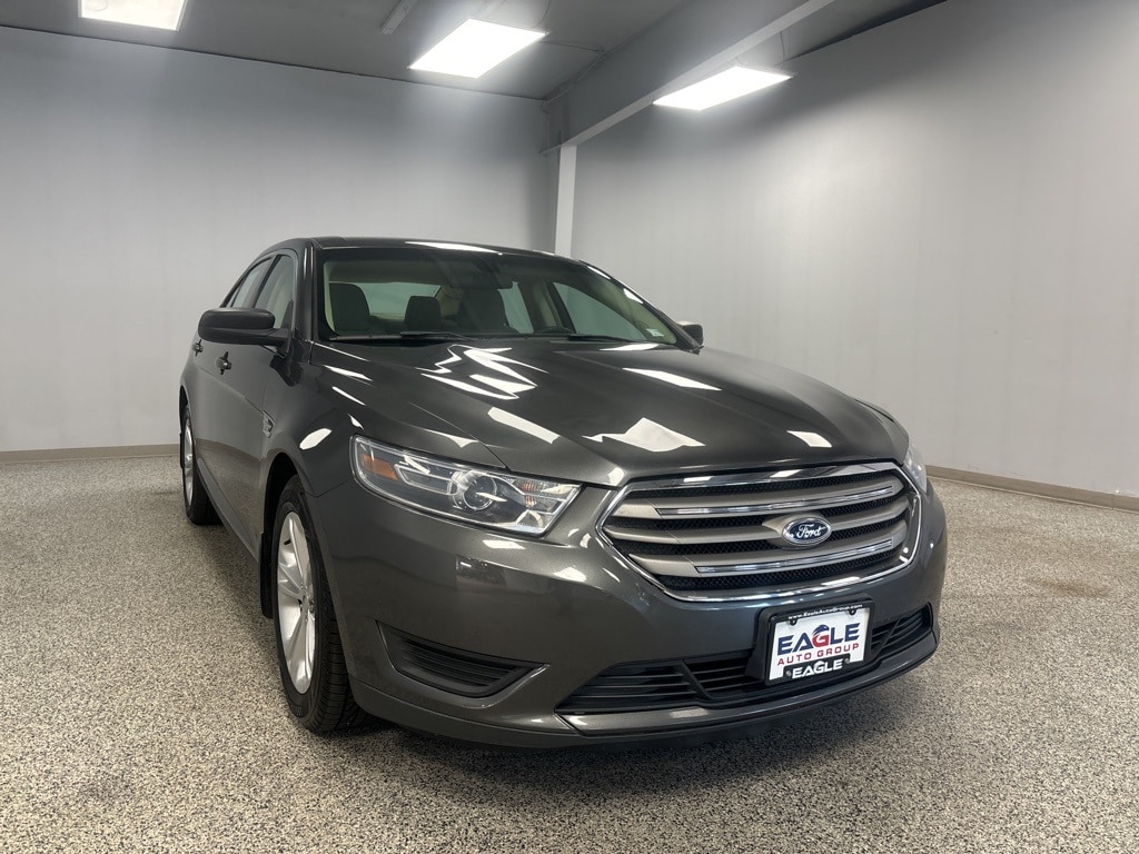 Used 2015 Ford Taurus SE with VIN 1FAHP2D84FG164657 for sale in Eagle River, WI