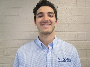 Staff member Alex Holmes from b2b41d41d4a9