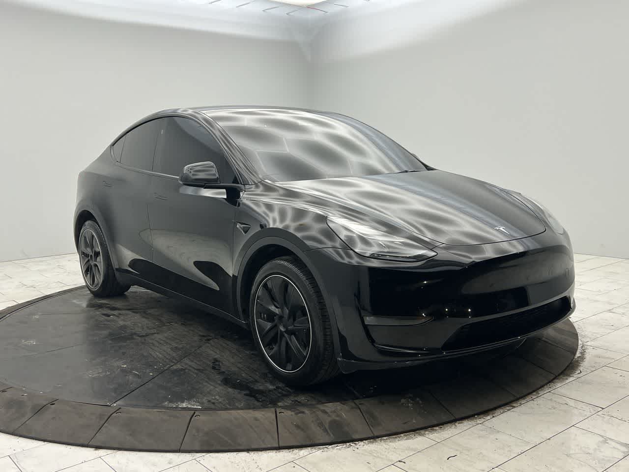 Used 2024 Tesla Model Y Long Range with VIN 7SAYGDEE1RA236956 for sale in Bronx, NY