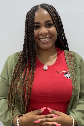 Staff member Jasmine Testamark from ID_a383354c75b8