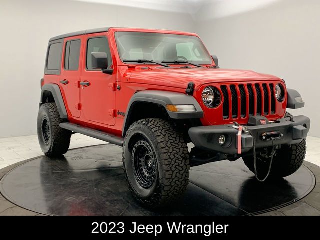 Used 2023 Jeep Wrangler 4-Door Altitude with VIN 1C4HJXDG5PW631785 for sale in Bronx, NY