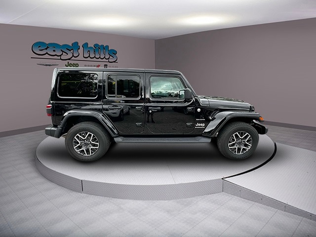 Certified 2024 Jeep Wrangler 4-Door Sahara with VIN 1C4PJXEN8RW129297 for sale in Greenvale, NY