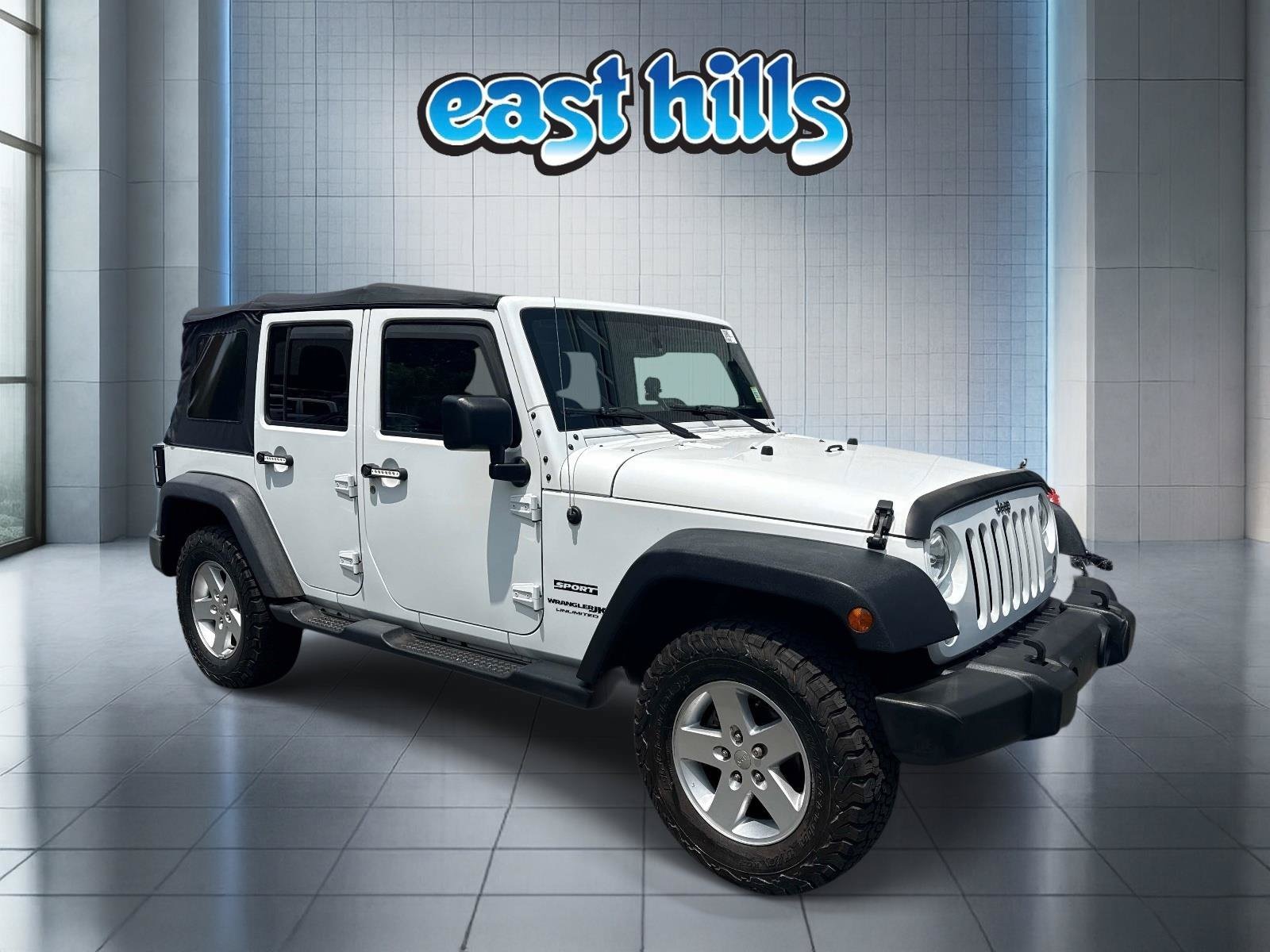 Used 2018 Jeep Wrangler JK Unlimited Sport S with VIN 1C4BJWDG9JL811649 for sale in Douglaston, NY