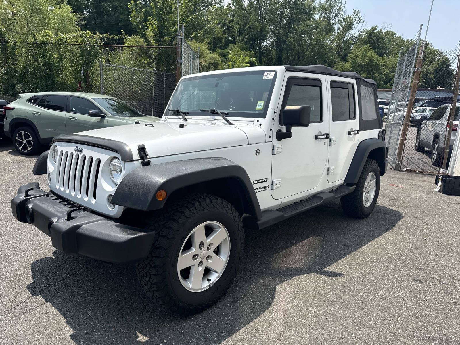 Used 2018 Jeep Wrangler JK Unlimited Sport S with VIN 1C4BJWDG9JL811649 for sale in Douglaston, NY