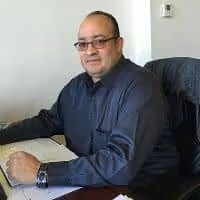 Staff member Gus Quinones from ID_3eb1e2