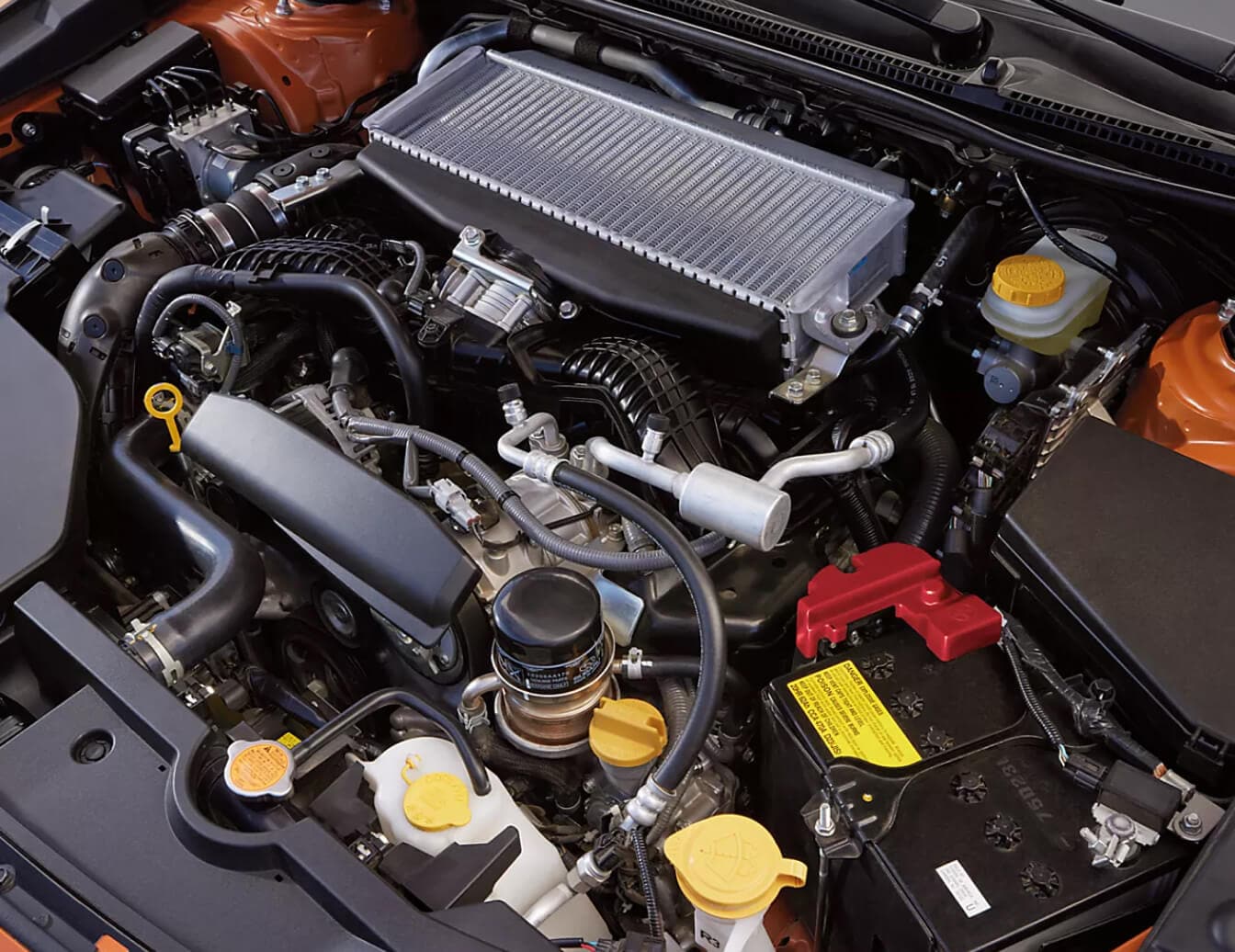 Close up under-the-hood- shot of a Subaru Boxer engine.