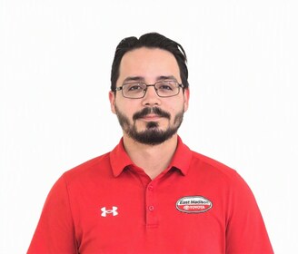 Staff member AJ Gonzalez from ID_251598