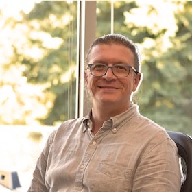 Staff member Brian Reddick from 03e6807b28c3