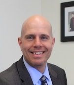 Staff member Chris Costello from ID_6f4375