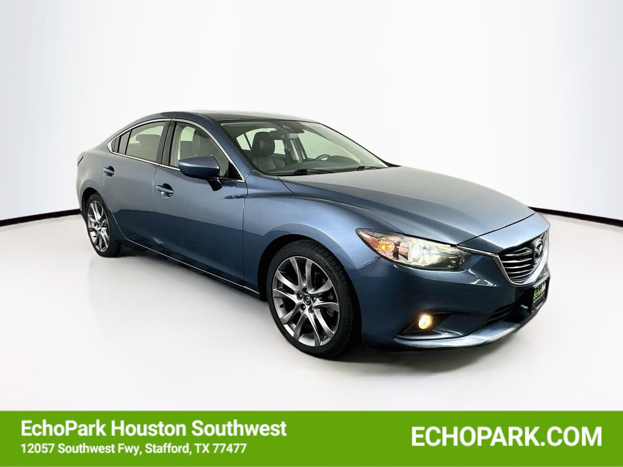 2015 Mazda EZ-6 i Grand Touring Auto's photo