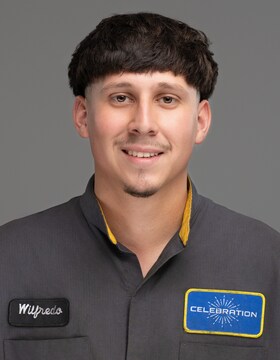 Staff member Wilfredo Gonzalez from ID_242311125bee