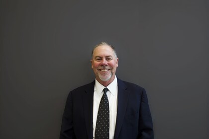 Staff member Tim Cook from ID_0e5e00