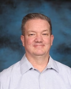 Staff member Burke Smith from 7524edb65f55