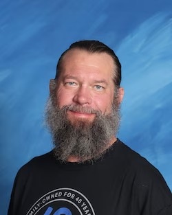 Staff member Michael Vaughan from 7524edb65f55