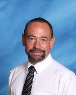 Staff member George Drakos from 7524edb65f55